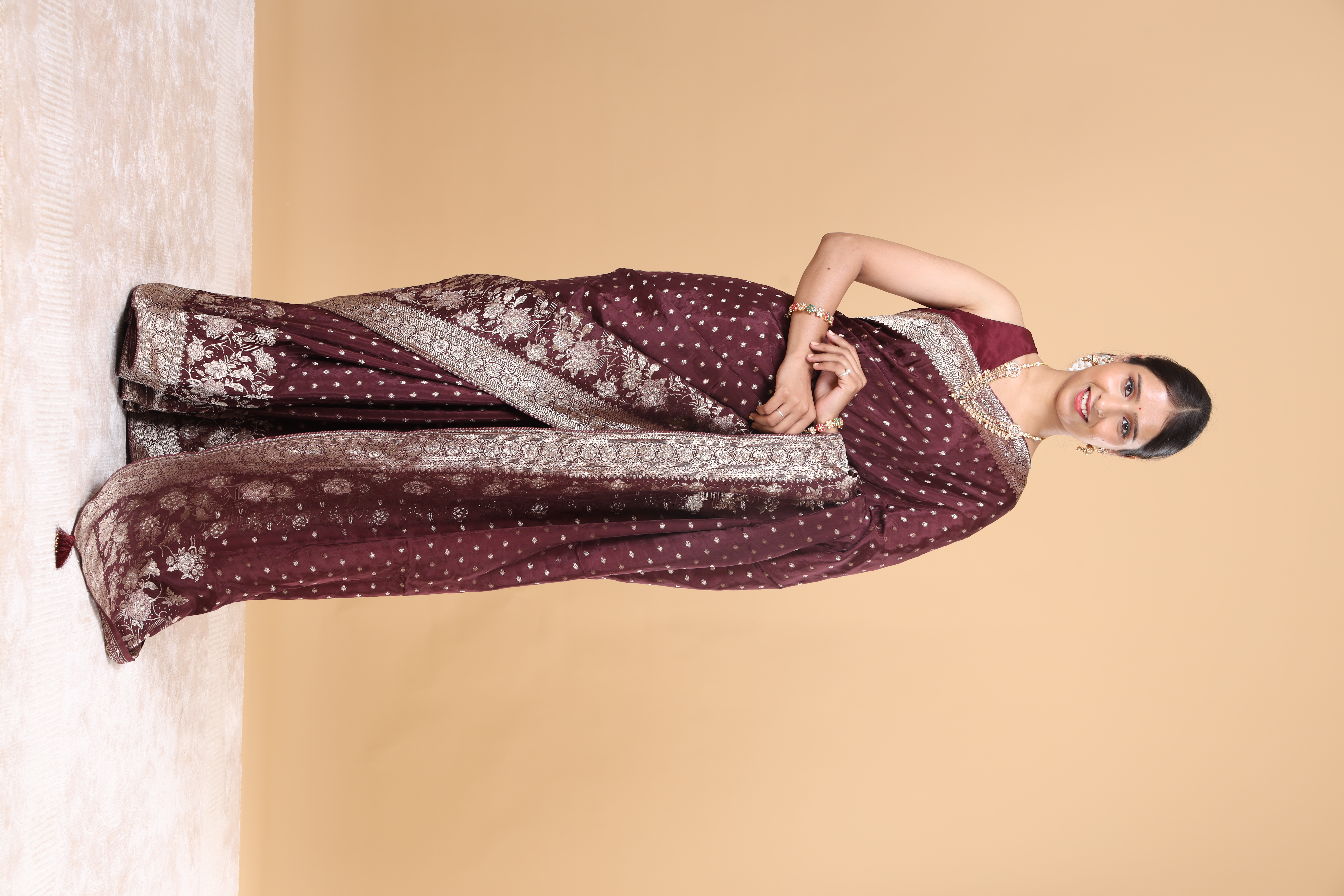 V Glame Solid Dark Maroon H.O Fabric Saree with Mina Zari Flower Motifs & Heavy Zari Border Pallu
